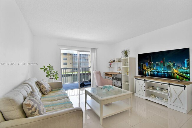 Building Photo - 3527 NE 168th St Unit 203