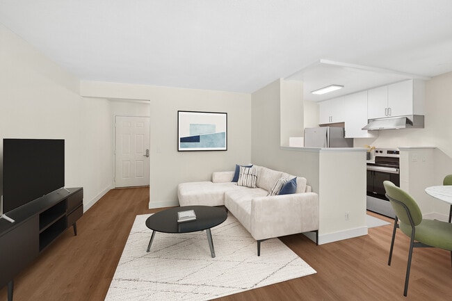 Renovated Package I living room with hard surface flooring - eaves San Jose