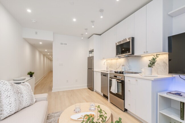 Furnished Living Room (Includes 55” TV + Atmos Speaker, Kivik Sofa, Orgami Dining + Coffee Tables) - 4037 Powelton Ave