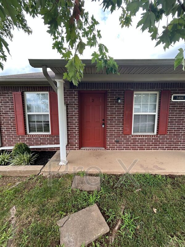 Building Photo - 3404 SW Landau Ct Unit Apt 2