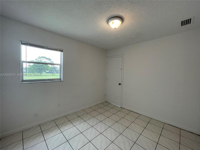 Photo - 7410 Woodmont Terrace Unit 204