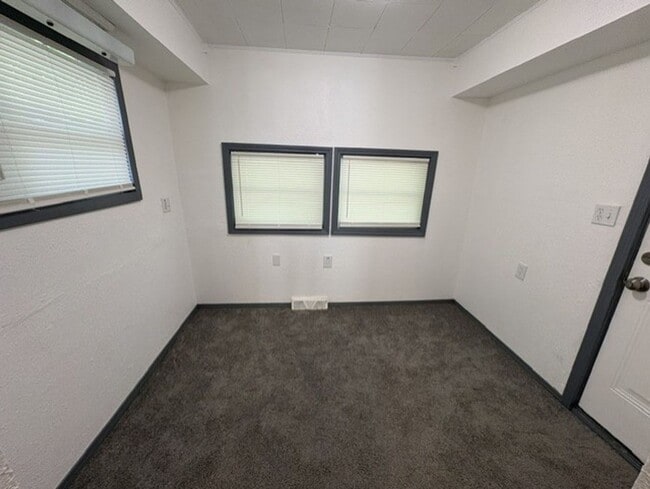Photo - Move-In Ready 2-Bedroom Home with Modern Kitchen, Basement & Front Porch