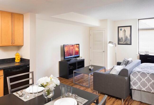 Dining and living area with hard surface flooring