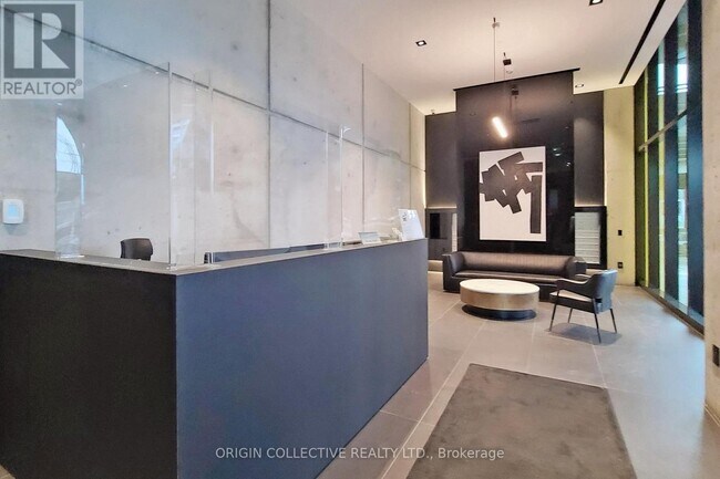 Photo - 21 Lawren Harris Square Unité 1109