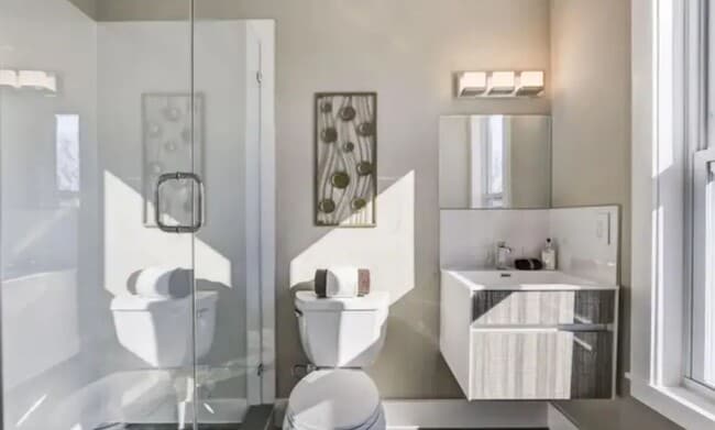 Photo - “Elegant 3-Story Home Showcasing High-End Renovation, Gourmet Kitchen, and Private Deck for Moder...