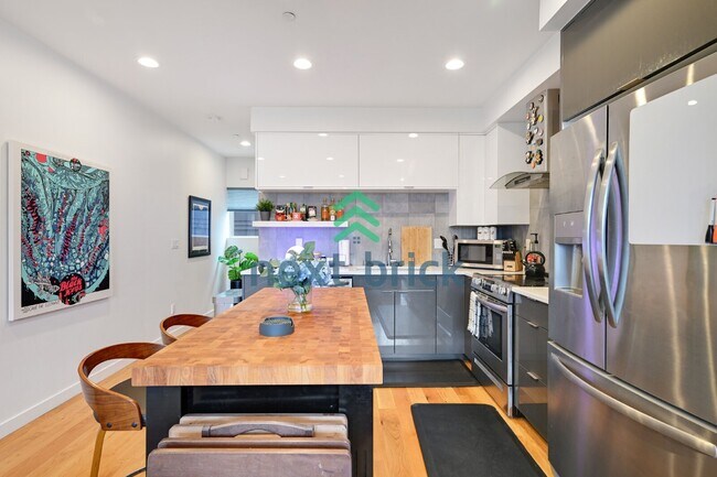 Photo - Charming 2-Bedroom Townhouse with 2.5 Baths and Spacious 1,510 Sq Ft in Seattle's Vibrant Neighbo...