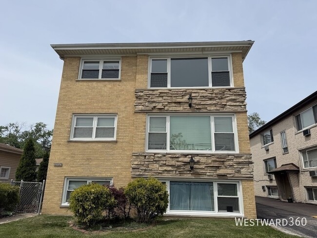 Building Photo - 8714 W Fullerton Ave Unit 2S