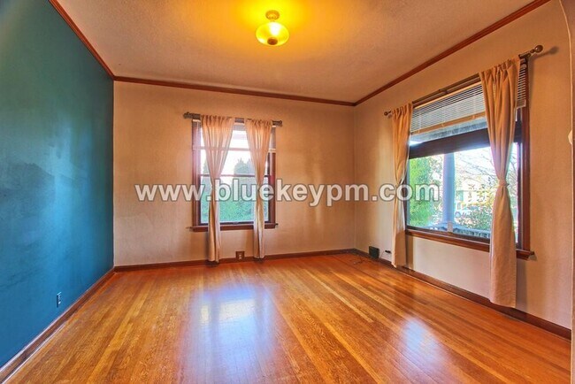 Photo - First Month Fee on a 12 Month Lease!  2 Bed, 1 Bath 2 Story Unit with Victorian Architectural Detail