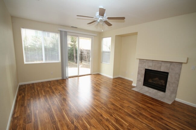 Photo - 4 Bed| 2.5 Bath | 2061 SF | 2 Car Garage | Long driveway with gate | Tenant pays $175 monthly for...