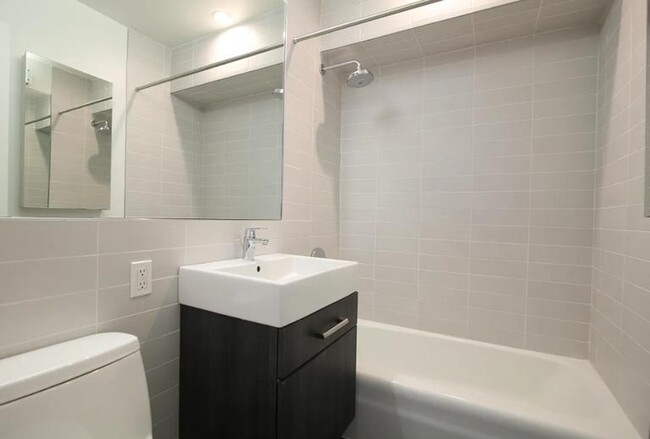 Photo - 113 W 15th St Apartment Unit 104