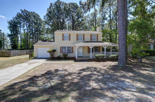 Building Photo - Spacious 3BR Home with Covered Front Porch & Expansive Backyard Near Dining & Shopping