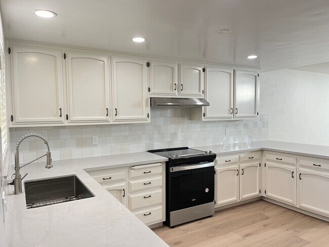 Photo - Updated 2 story Condo in Central Location ...