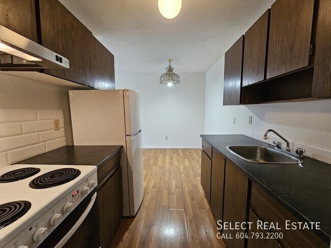 Photo - 33924 George Ferguson Way Unit 301