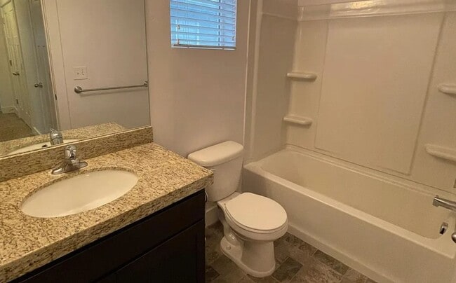 Photo - Spacious 4-Bedroom Home with Finished Basement in Taylorsville
