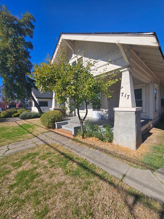 Photo - 1/2 OFF FIRST MONTH'S RENT IF RENTED IN DEC! Charming 2 Bedroom with Bonus/Laundry Room