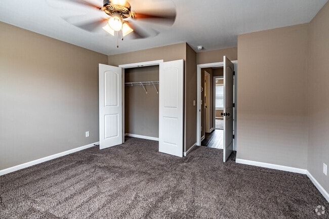 2BR, 1.5BA - 908SF - Primary Bedroom - Rossview Villages