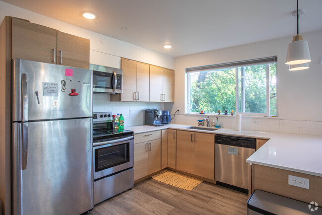 Modernized Apartment Kitchen - Bertona Steps Apartments