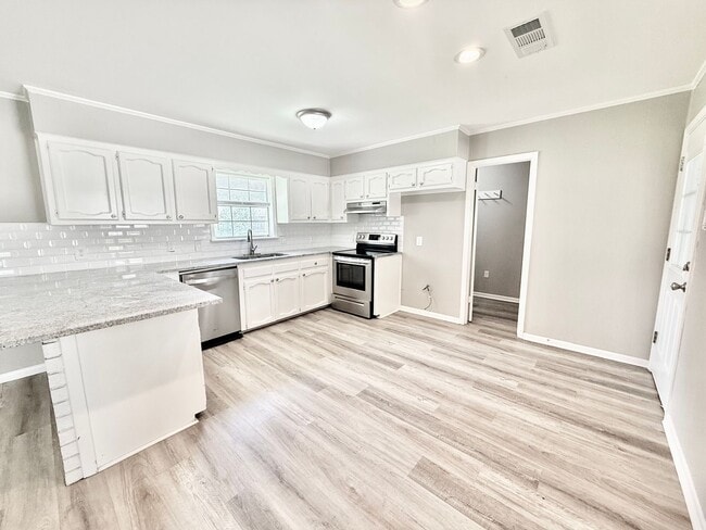 Photo - Bright & Spacious 3 Bedroom Brick Home with Double Carport & Large Backyard