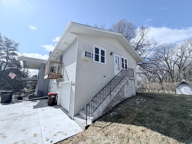 Photo - Stylish Townhome-Style 1BR with Patio, Garage & In-Unit Laundry!