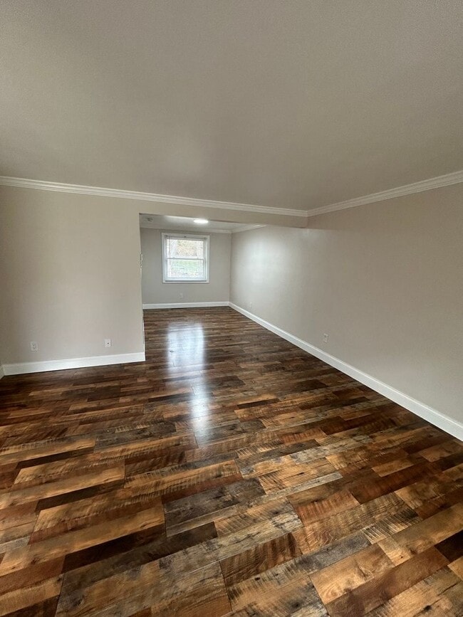 Photo - Modern Charm: 2 BR Home with Finished Basement, Pet Friendly, Assigned Parking, and Prime Location!