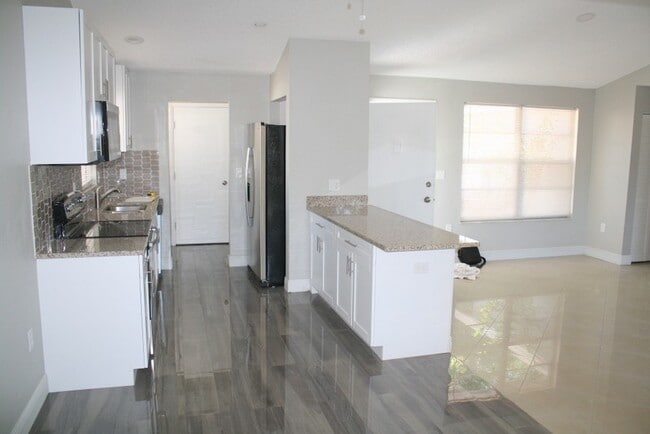 Photo - Beautifully updated over size 2 bed 2 bath 1 car garage home!