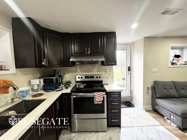Photo - Spacious 3-Bedroom + Den Walk-Out Basement... Unit 2