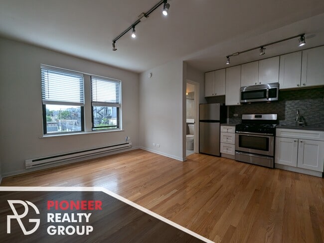 Building Photo - 2832 W Palmer St Unit 306