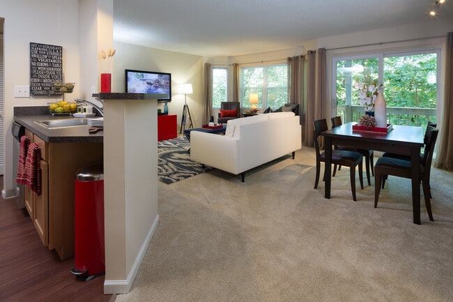 Classic Package living and dining room with carpet