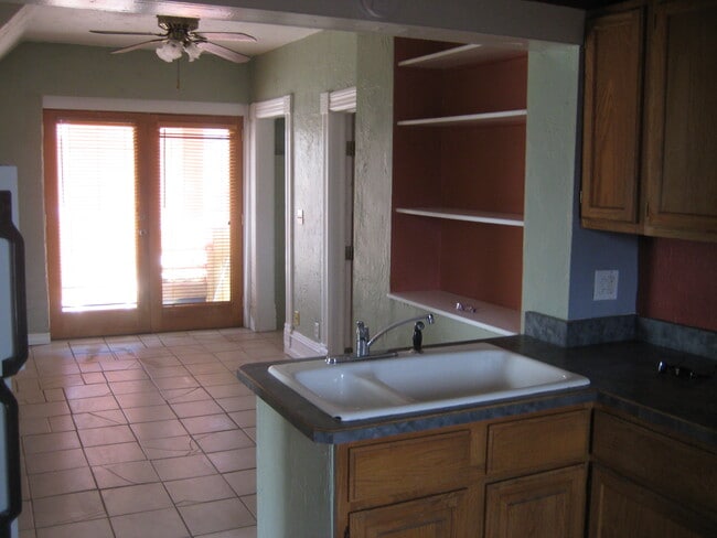 Nice western light and view of Grome park for small balcony/entryway - 219 Midway Ave. UPSTAIRS