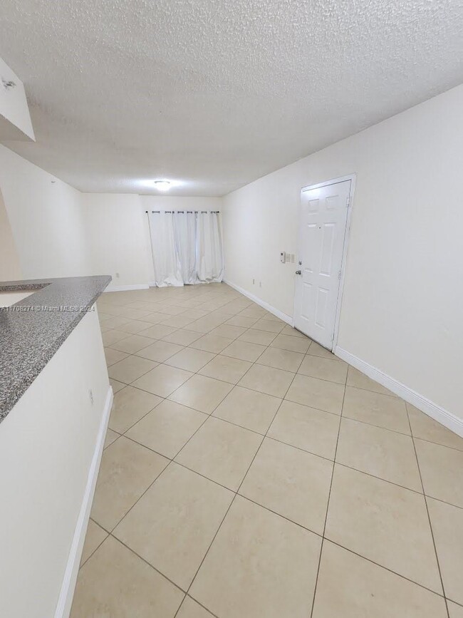 Photo - 5035 Wiles Rd Condo Unit 103