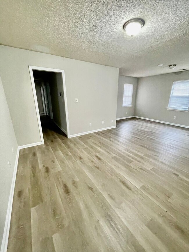 Photo - Welcome to this charming 3-bedroom, 2-bathroom home located in the vibrant city of Charlotte, NC.