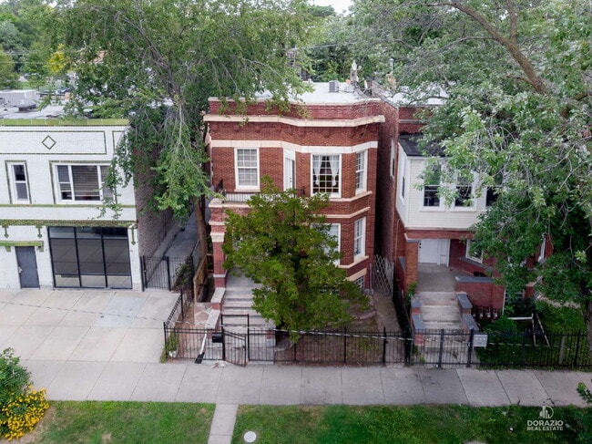 Building Photo - Modern 4BR Apartment with Hardwood Floors, Balcony & Central A/C Unit 2