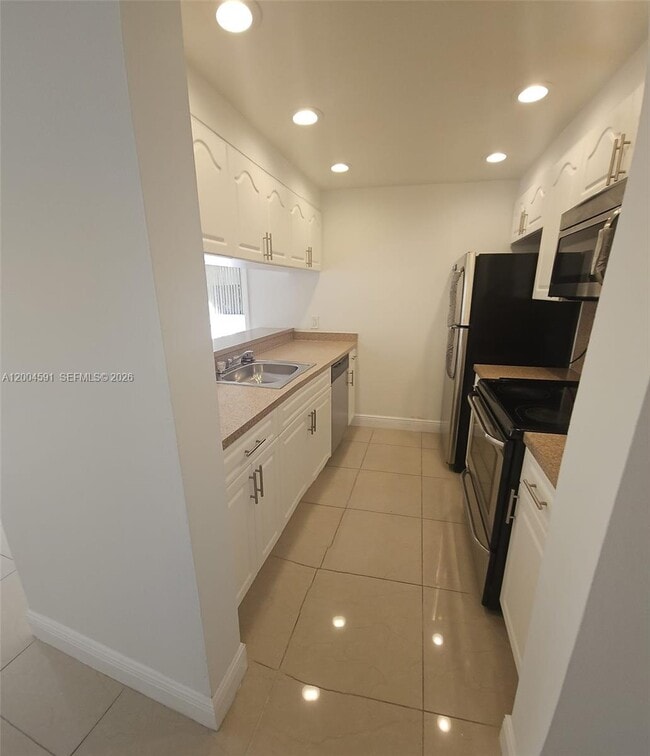 Building Photo - 8160 Geneva Ct Unit 208