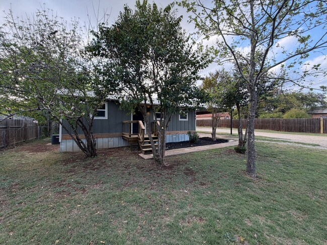 Photo - Charming 2BR/1BA Home with Fenced Yard & Mature Trees in Downtown Blanco!
