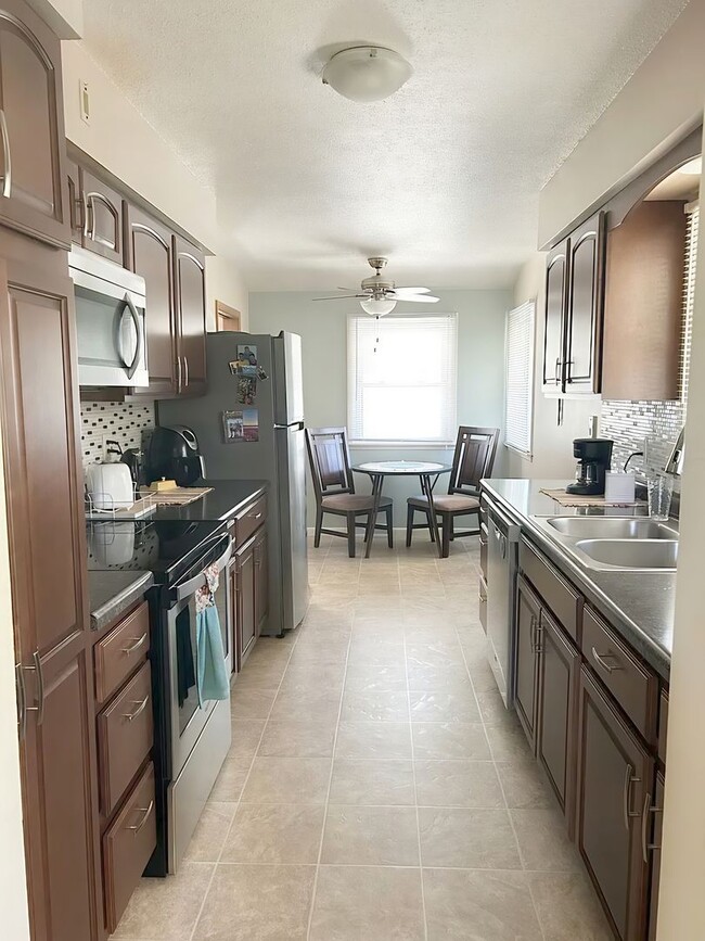 Photo - Charming & Updated 3-Bedroom Home with Sunroom, Fireplace & Garage