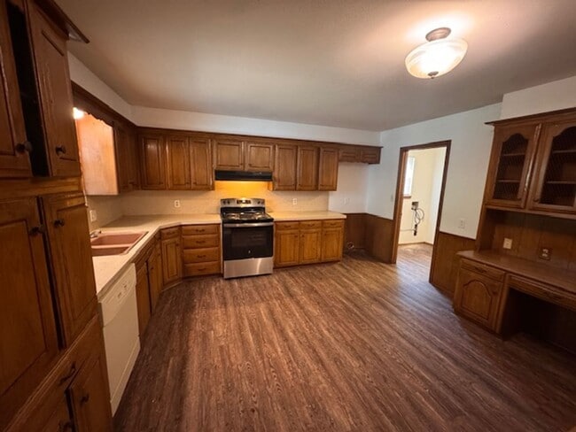 Photo - 2 living areas and a bonus room, new flooring and paint!  Call today for your personal tour 405-6...