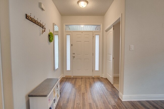 Photo - Spacious 4BR/2BA Brick Home with 2-Car Garage, Granite Kitchen, Vaulted Ceilings & Fully Fenced B...