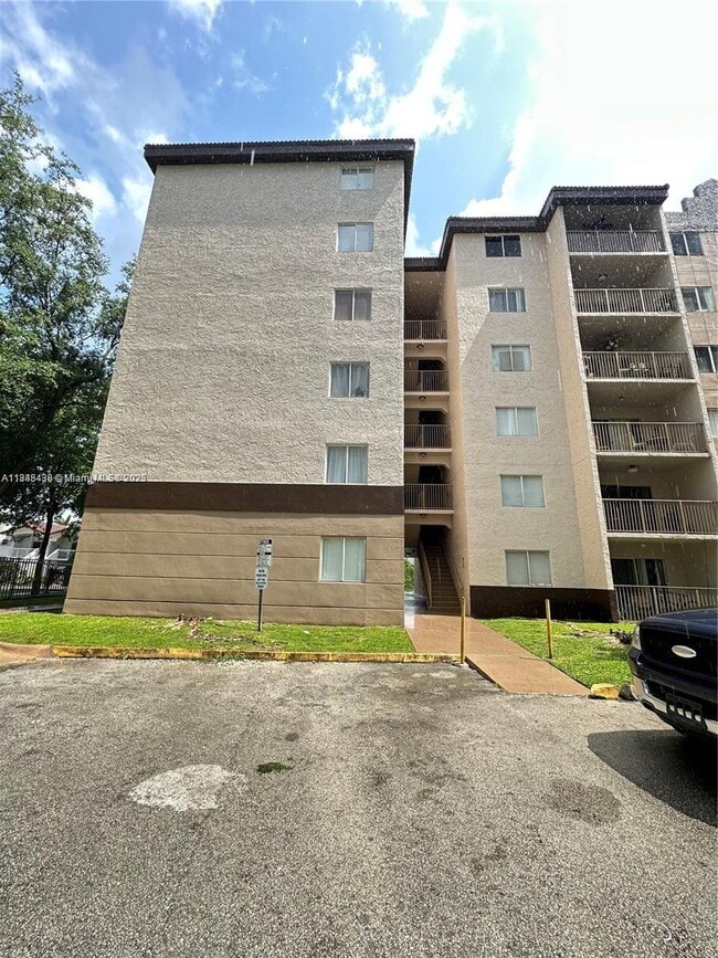Building Photo - 15231 SW 80th St Unit 401 Rental
