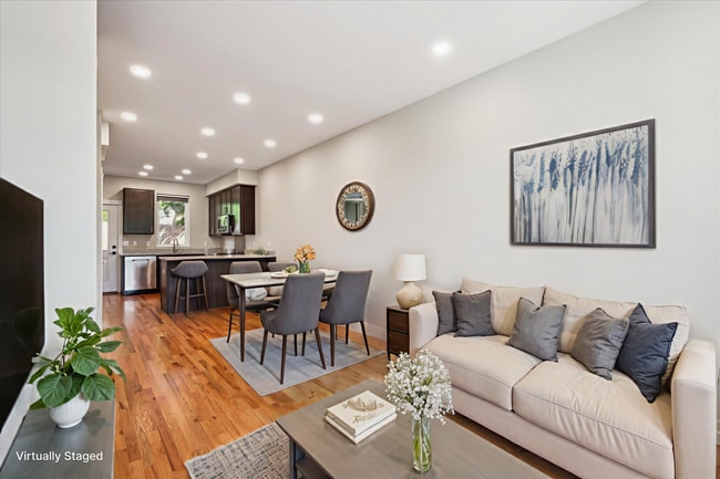 Photo - Modern 4-Bedroom Townhome with Rooftop Deck Near Sloan’s Lake & Light Rail