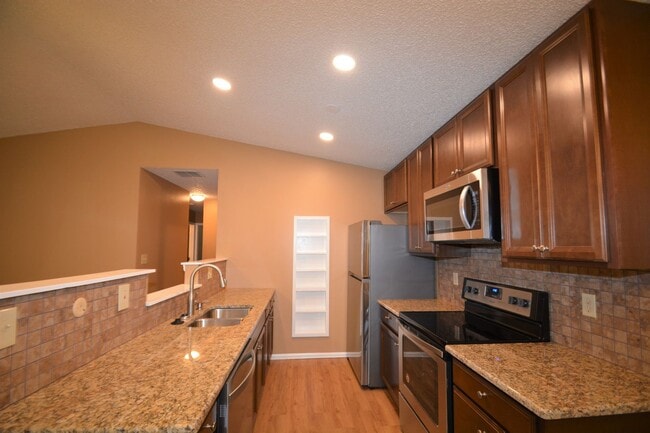 Photo - Townhome - 2 bedrooms, 1 bathroom & 1 car garage - A/C will be installed!! NO PETS ALLOWED!