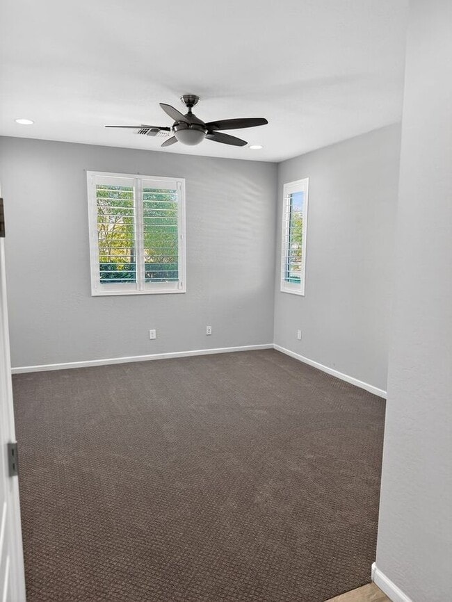 Photo - Stunning 5 Bed/5Bath Home in Gated Community – Over 3,100 SqFt of Modern Living -New Carpet throu...