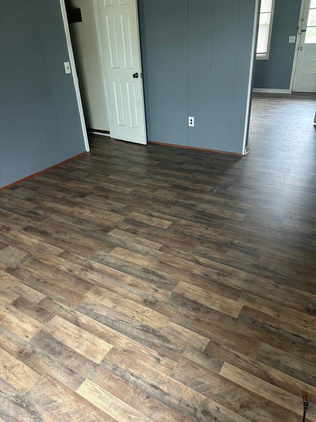 Brand new flooring throughout the main level - 1140 E Main St