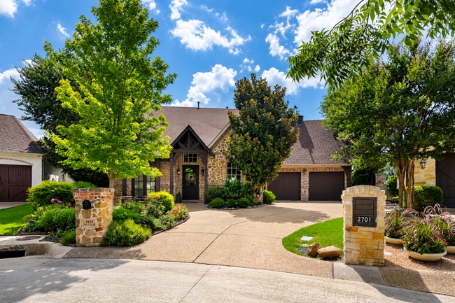 Building Photo - A Gated River Park Estate Where Timeless Tudor Elegance Meets Resort-Style Living
