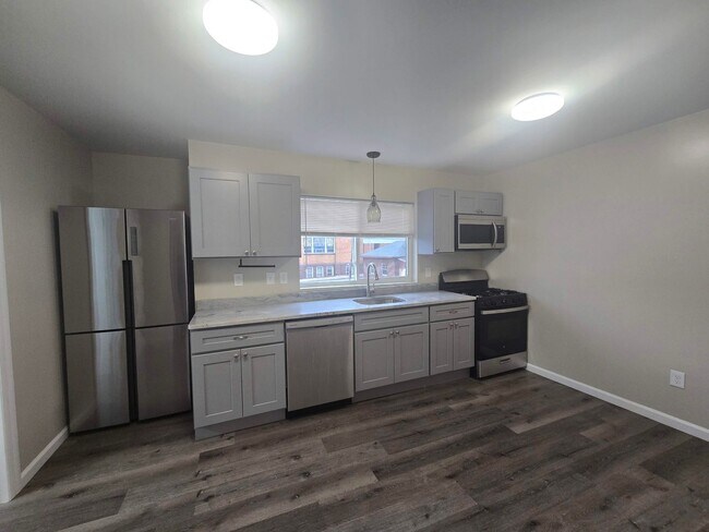 Photo - NEW LISTING: 1-Bed w/ Private Laundry & Parking Unit 3