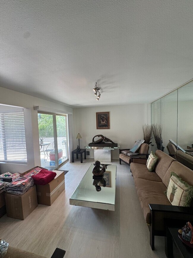 Photo - Gorgeous Condo in Seward Park with 2 Parking Spaces, Steps Away from Pool with Water View! Unit 203