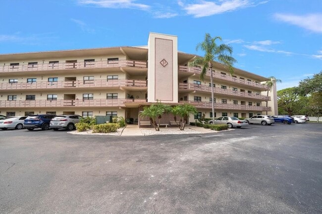 Building Photo - 6188 80th St N Unit 210