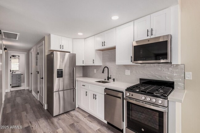Building Photo - 3331 N 66th Pl Unit 4