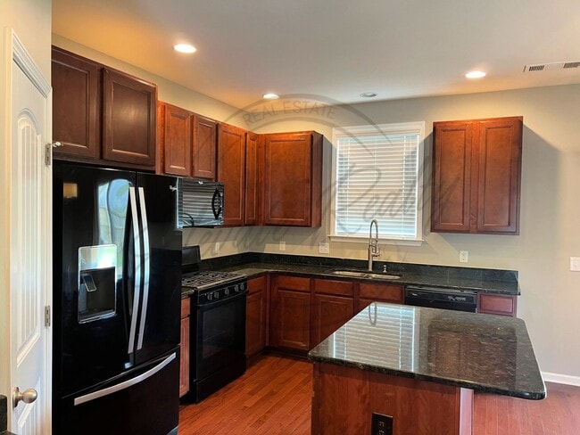 Photo - Three Bedroom, Fully Fenced Two Story with a Community Pool & Fitness Center!