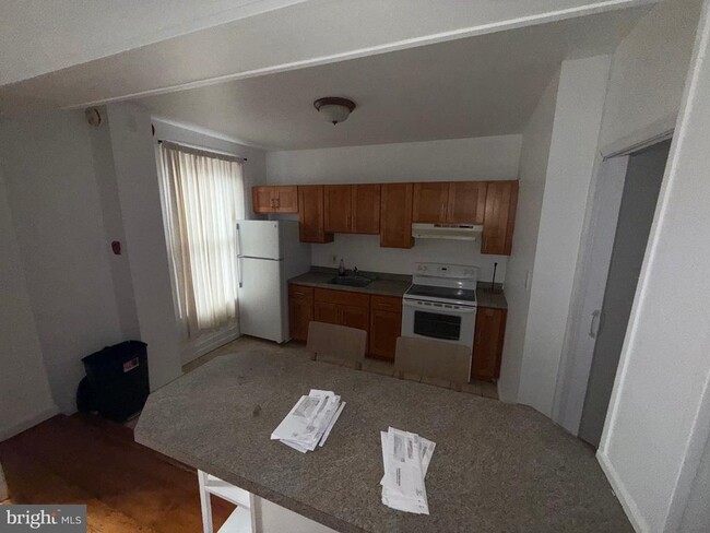 Building Photo - 600 E Girard Ave Unit 1R