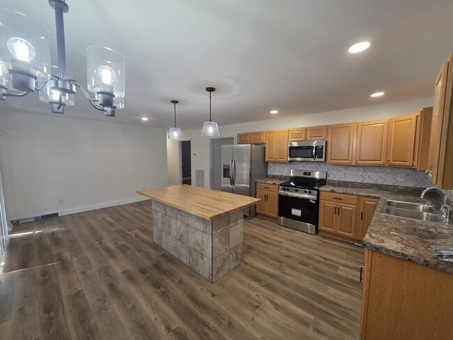 Photo - Renovated 3-Bed/2-Bath Home with Carport & Fenced Yard – Near Fort Campbell!